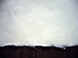 白い粘土質の土を混ぜて漉いた和紙